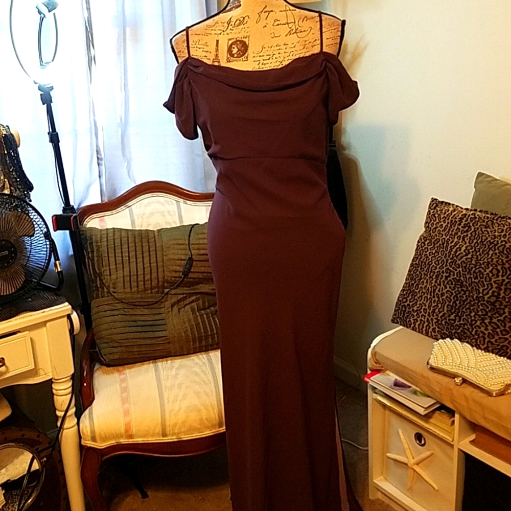 Dress by  Alago gowns